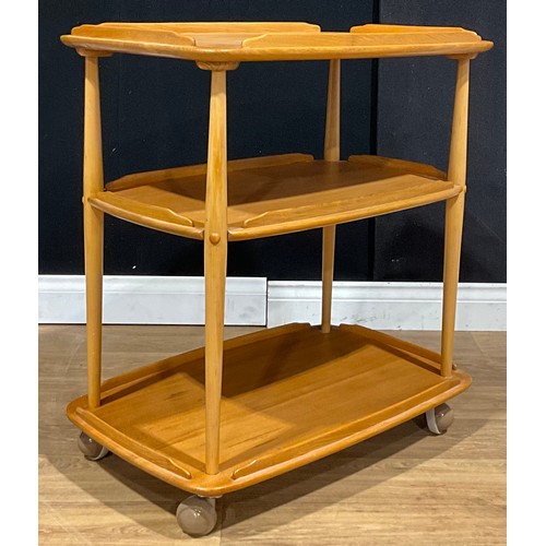 210 - An Ercol beech and elm three tier trolley, 76.5cm high, 71.5cm wide, 46cm deep