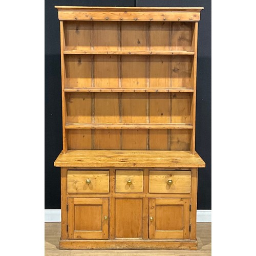 211 - A late Victorian pine dresser, 205cm high, 124cm wide, 49cm deep