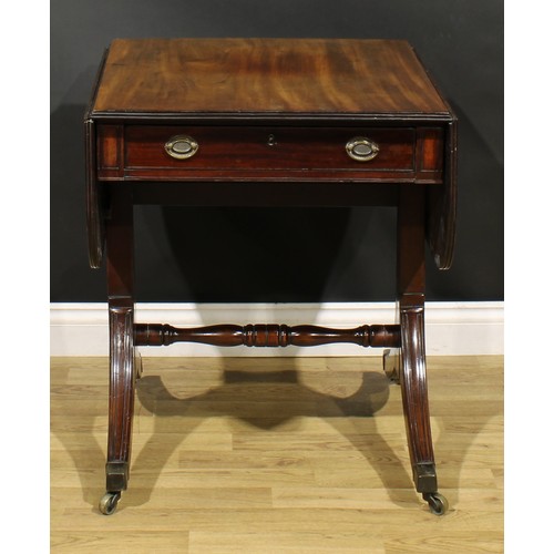 386 - A 19th century mahogany sofa table, rounded rectangular top with fall leaves above a frieze drawer, ... 