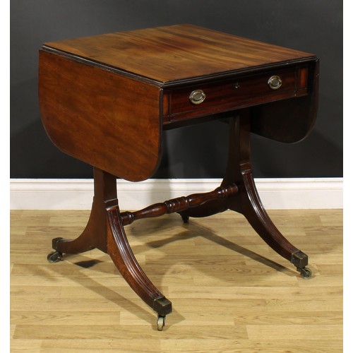 386 - A 19th century mahogany sofa table, rounded rectangular top with fall leaves above a frieze drawer, ... 