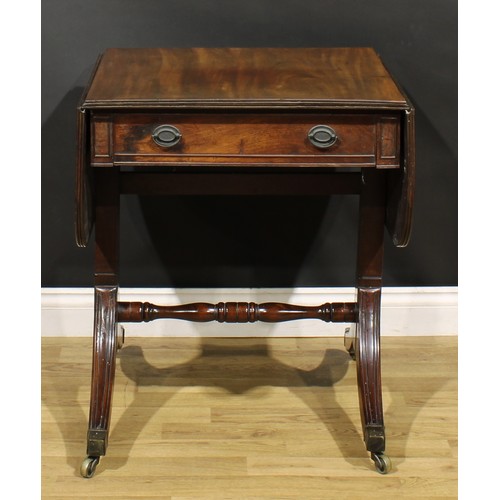 386 - A 19th century mahogany sofa table, rounded rectangular top with fall leaves above a frieze drawer, ... 