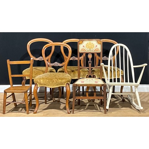 387 - A set of four Victorian walnut balloon back dining chairs; a painted Ercol rocking chair; a child’s ... 