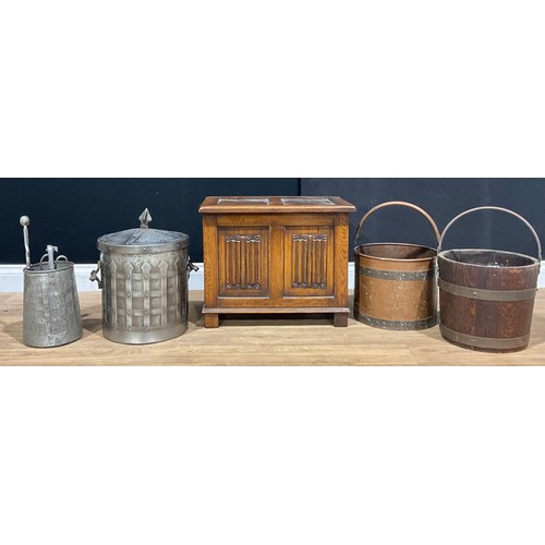 390 - A coopered oak bucket, by R.A. Lister & Co Ltd; a small oak linenfold chest; fuel bin; etc (5)