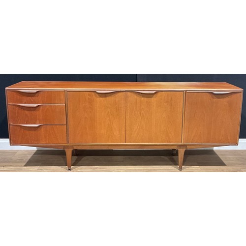 391 - A retro mid-20th century teak sideboard, by McIntosh, 76cm high, 201.5cm wide, 45.5cm deep excluding... 