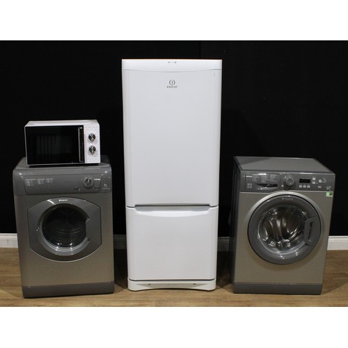 407 - An Indesit fridge freezer; a Hotpoint WMBF 742G washing machine; a Hotpoint TVHM80CG tumble dryer; a... 