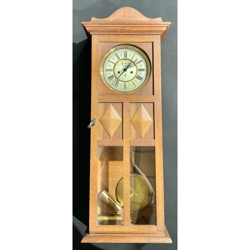 205 - An Arts & Crafts oak Vienna wall clock, by Gustav Becker, c.1925