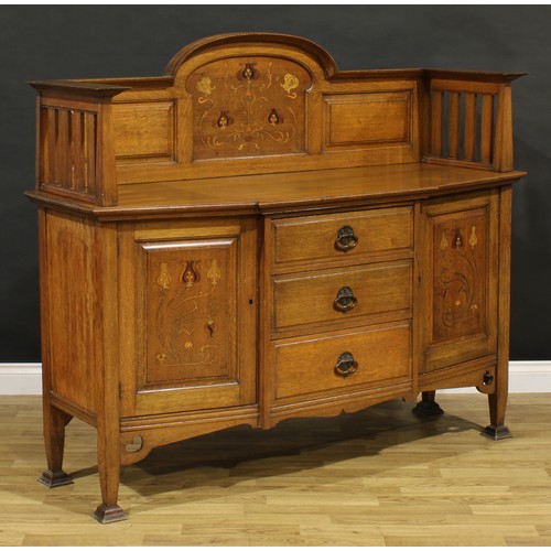 115A - An Arts & Crafts oak and marquetry side cabinet, three-quarter gallery inlaid in the Art Nouveau tas... 