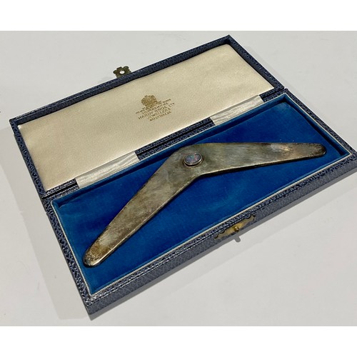 573 - A silver miniature presentation model, of a boomerang, set with opal, Hardy Bros. Ltd., Australia, m... 