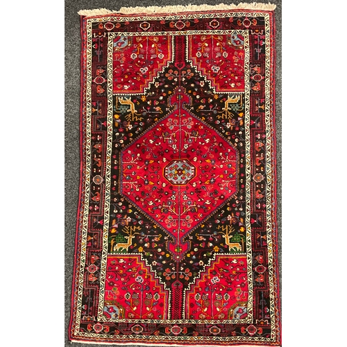 591 - Middle East and the Orient - an Iranian Hamadan wool rug or carpet, 232cm x 137cm