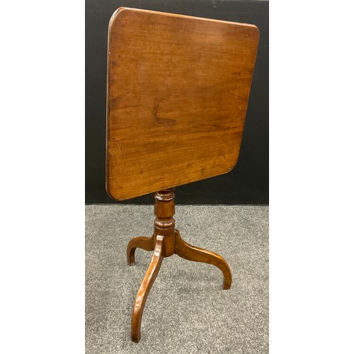 25 - A 19th century mahogany tripod occasional table, rounded rectangular tilting top, turned pillar, dow... 