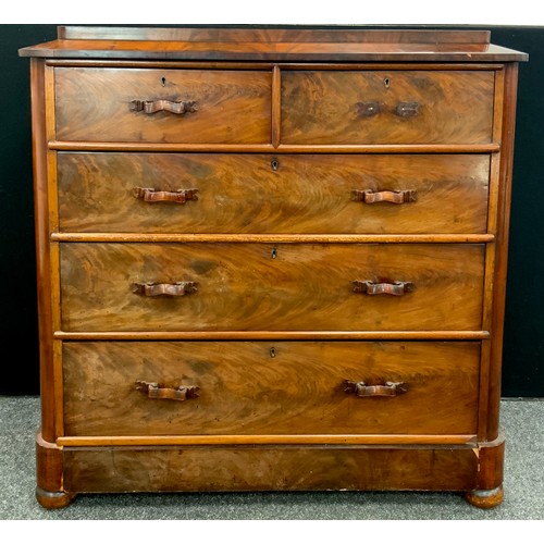 35 - An early Victorian mahogany chest, sarcophagus top above two short and three long graduated drawers,... 