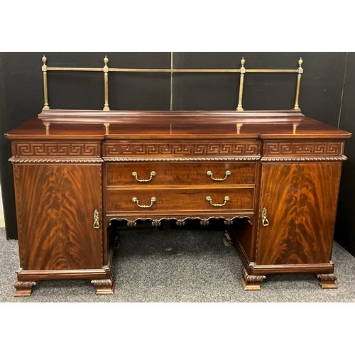 249 - A George III revival mahogany sideboard, neoclassical design, having a brass quarter galleried back ... 