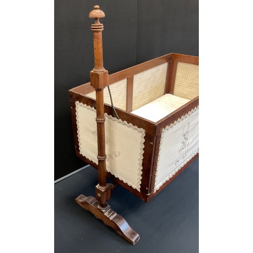 252 - A 19th century style rocking crib or cradle, rectangular needlework panelled rocking cradle, wrought... 