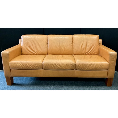 263 - A Natuzzi Italia pale tan leather three seat sofa, 98cm high (57cm high to seat) x 225cm wide x 94cm... 