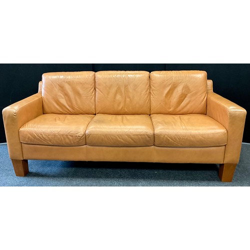 264 - A Natuzzi Italia pale tan leather three seat sofa, 98cm high (57cm high to seat) x 225cm wide x 94cm... 