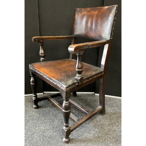 268 - A set of eight Charles II style oak and studded leather/leatherette dining chairs, two carver chairs... 