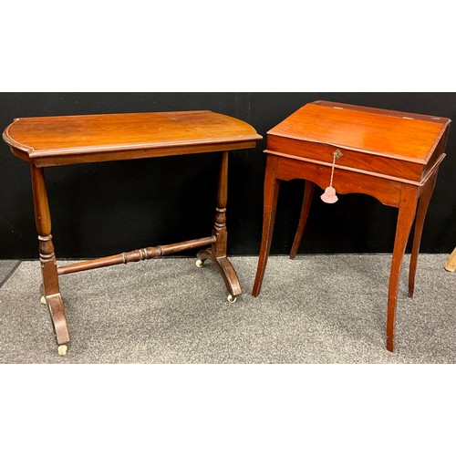 284 - A mahogany slope top school type desk, of small proportions, fall front interior, 85cm x 61cm x 53cm... 