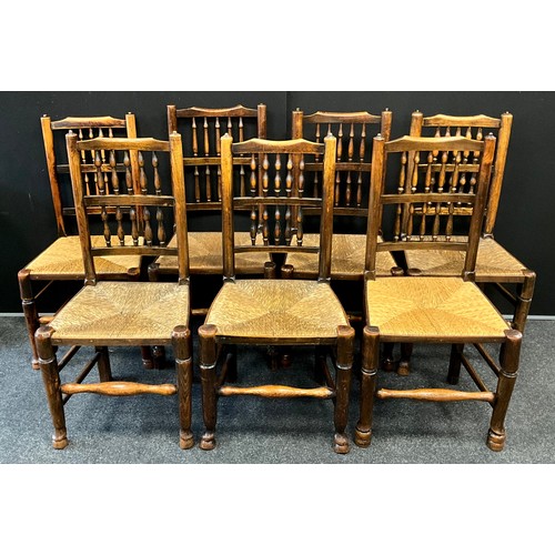 286 - A set of seven George III oak and elm rush-seated chairs, spindle backs, turned supports, 99.5cm hig... 