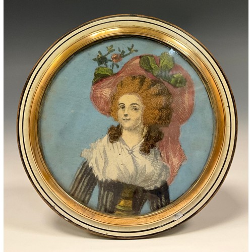 319 - An early 19th century circular snuff box, with hand coloured engraving of a lady to cover, the rear ... 