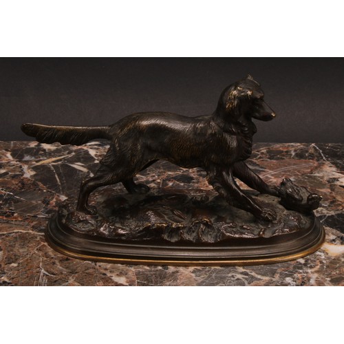 324 - French School (19th century), a brown patinated bronze, of a retriever dog, oval base, 18cm long