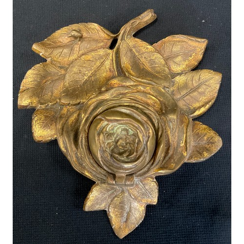 327 - A 19th century gilt bronze inkwell as a Rose, clear glass liner, 17cm wide