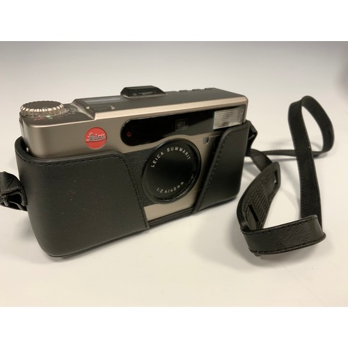 328 - Leica - a Minilux Compact Camera, black and brushed titanium coloured case, serial no. 2126879, c.19... 