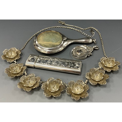 438 - Silver - a silver filigree seven panel flowerhead necklace;  novelty pill box as a hand mirror, toot... 