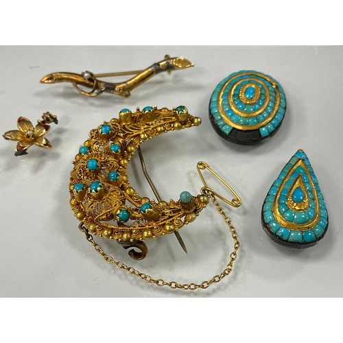 446 - A turquoise and filigree crescent brooch brooch, with thirteen turquoise cabochons, unmarked yellow ... 