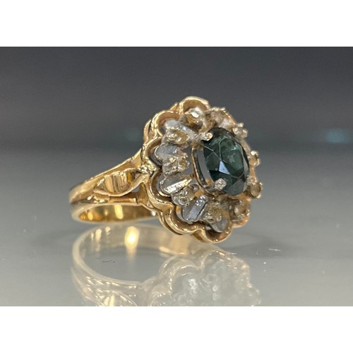 461 - A green and white stone dress ring, yellow metal shank, stamped 585, Y68, size O, 4.1g gross