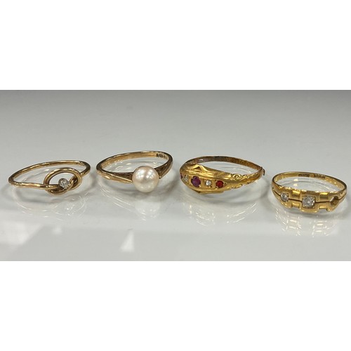 462 - A diamond ring, 18ct gold shank, another ruby and diamond, 3.8g gross;  a 9ct gold cultured pearl ri... 