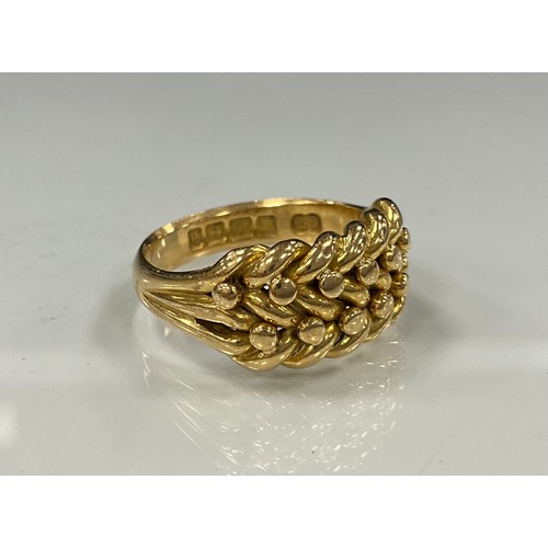 467 - A Victorian 18ct gold rope and bead crest signet ring, Birmingham 1900, size O, 8.9g.