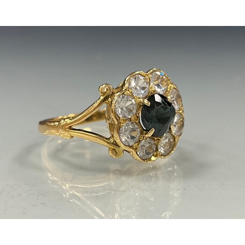 469 - A Cz sapphire and diamond effect dress ring, unmarked yellow metal shank, size P, 4.6g gross