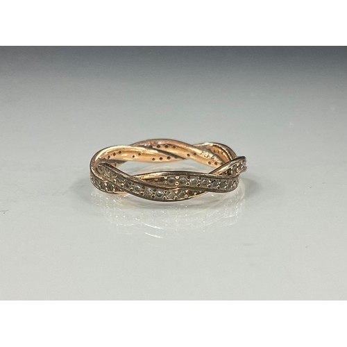 470 - A white stone possibly sapphire twisting interconnected double layer eternity ring, white and rose m... 