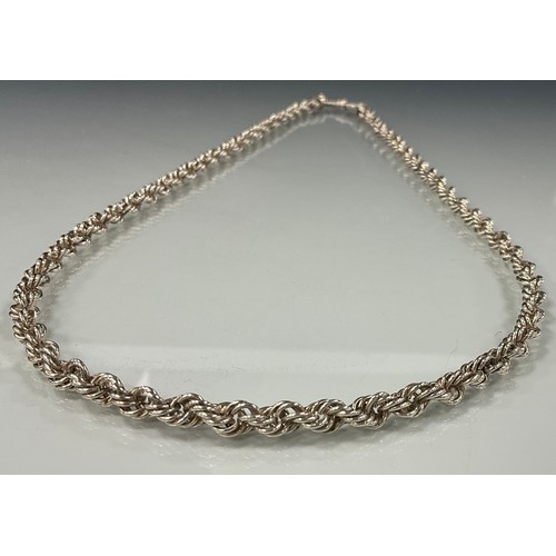 494 - An indistinctly marked silver rope twist necklace, 53cm long, purchased in the Philippines, 41.9g gr... 