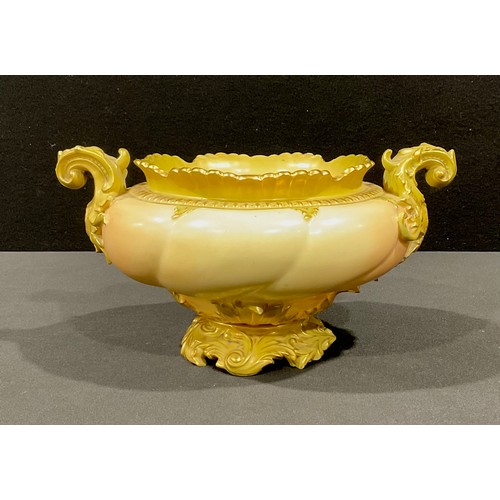 30 - A Royal Worcester rococo style bowl, scrolling acanthus leaf handles and pedestal base, in blush ivo... 