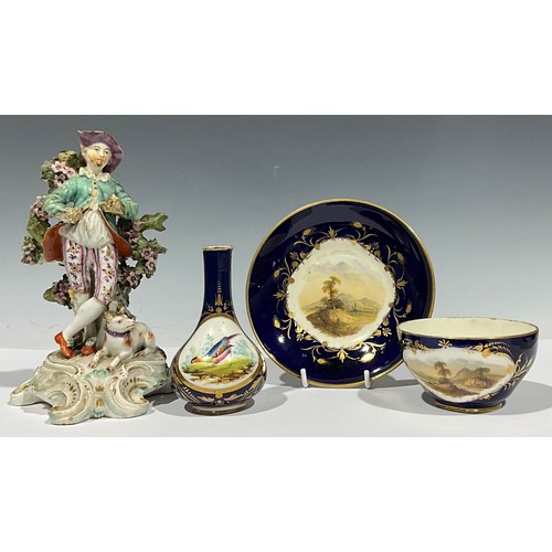 33 - A Duesbury Derby vase, bird panel; a cup and saucer; an 18th century figure