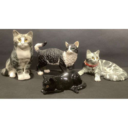 39 - A Winstanley style model, of a seated cat, signed Mike Hinton, 27cm high; another, of a recumbent ca... 