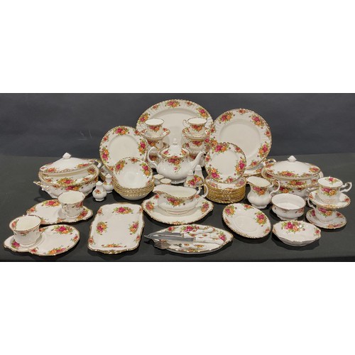 45 - A Royal Albert Old Country Roses dinner and tea service for six, comprising vegetable dishes and cov... 