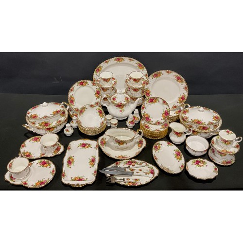 45 - A Royal Albert Old Country Roses dinner and tea service for six, comprising vegetable dishes and cov... 