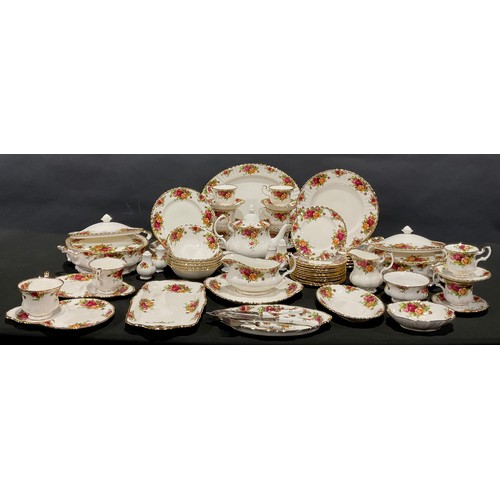 45 - A Royal Albert Old Country Roses dinner and tea service for six, comprising vegetable dishes and cov... 