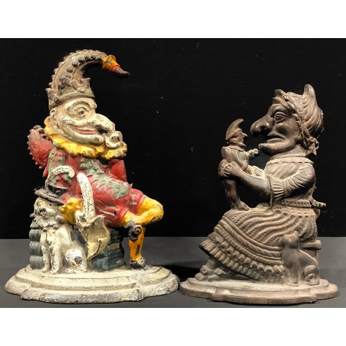 98 - A pair of late Victorian cast iron novelty figural doorstops, as Punch and Judy, Punch painted in po... 