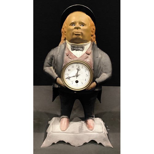 129 - A cast iron novelty Bradley & Hubbard mantel clock, cast as John Bull, dated July 1887, automaton ey... 