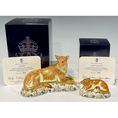 9 - A pair of Royal Crown Derby paperweights, Lioness and Sleepy Lion Cub, both are number 216 of a gold... 