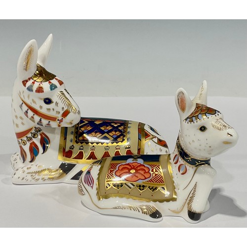 21 - A Royal Crown Derby paperweight, Donkey, gold stopper, signed in gold on the base by Cheryl Hallam, ... 