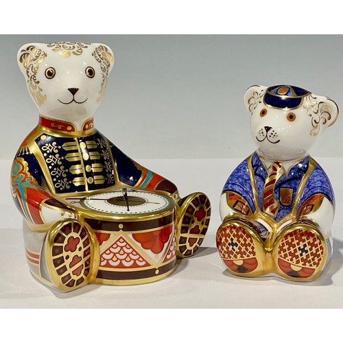 22 - A Royal Crown Derby paperweight, Drummer Teddy, gold stopper, 11cm high, designed by John Ablitt; an... 