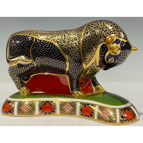 25 - A Royal Crown Derby paperweight, Grecian Bull, the base printed with an 1128 pattern border, gold st... 