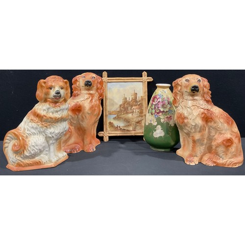 65 - A pair of Victorian Staffordshire mantel dogs, glass eyes, 32cm high; another mantel dog; a Stafford... 