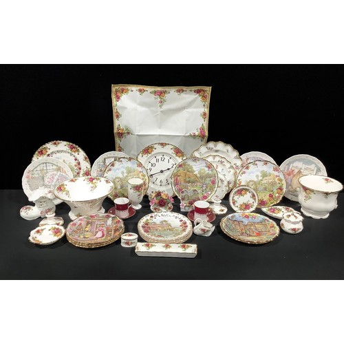 67 - A graduated set of three Royal Crown Derby Derby Days shaped circular plates, the largest 26cm diame... 