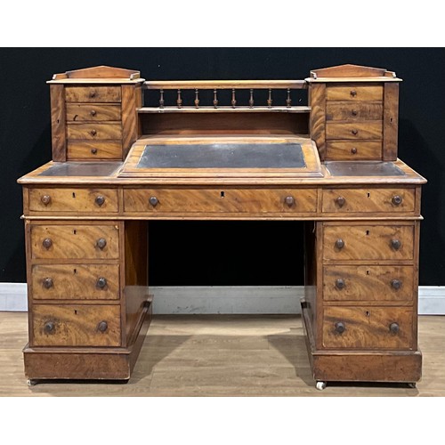 107 - A Victorian mahogany twin pedestal Dickens desk, 106.5cm high, 134cm wide, 62cm deep