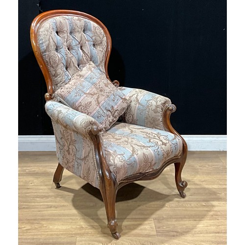 480 - A Victorian mahogany spoonback armchair, c.1850